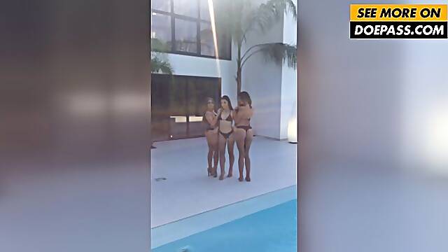 Funny poolside shoot with three models