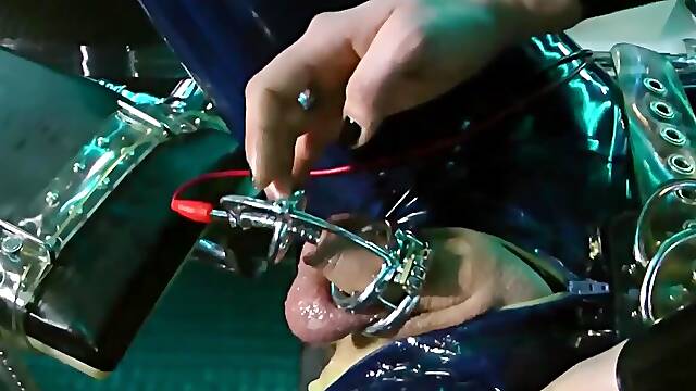 Kinky mistress dominates her slave in latex BDSM scene